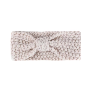 Close-up of knit texture and knot detail on a beige bohemian baby winter headband