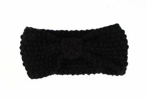 Detail of black chunky knit baby headband with central bow knot and textured weave pattern