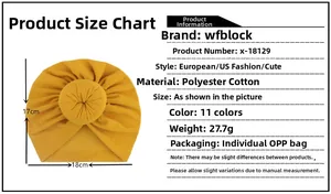 Detailed dimension chart for the yellow cotton blend baby turban hat with a top knot