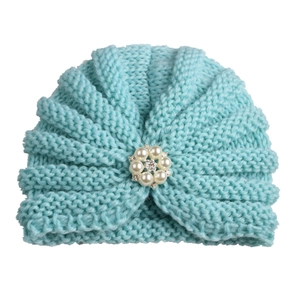Light blue knitted baby turban hat with decorative pearl and crystal flower embellishment