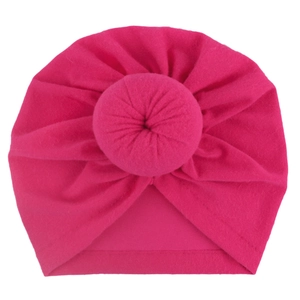 Solid color baby donut knot turban hat in bright rose pink for infant headwear
