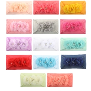 Colección de 14 diademas para bebé en colores variados con flores de gasa en capas y perlas