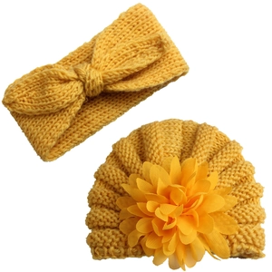 Knitted baby set with flower beanie and bow headband in bright yellow wool