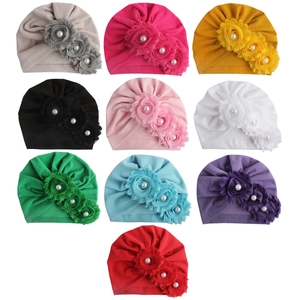 Set di 10 cappelli a turbante per neonati con fiori di perle e morbido tessuto elastico