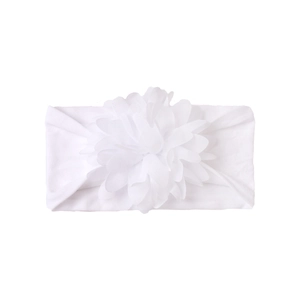 Detail of white baby headband with large chiffon flower petal layers and soft elastic fabric