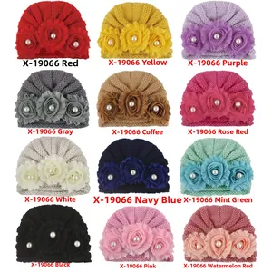 Detail display of baby knit beanies in 12 colors with mesh flowers and pearls