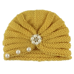 Knitted mustard yellow baby turban hat with elegant faux pearl floral cluster decoration