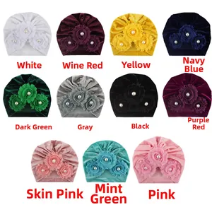 Grid display showing 11 colors of baby velvet turban hats with 3D flowers and pearls