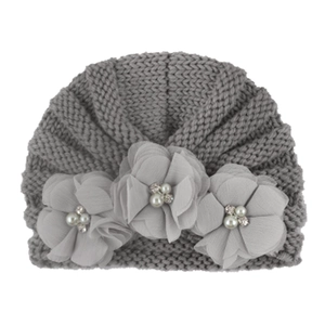 Gray knitted baby beanie featuring three chiffon flowers with pearls and rhinestones