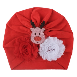Red Christmas baby hat with glitter reindeer and chiffon roses in a soft knitted style