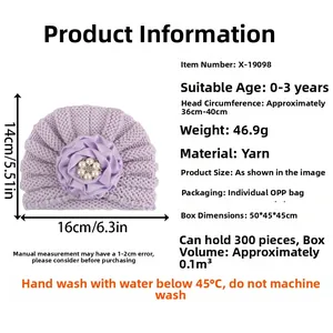 Spécifications de taille pour un bonnet en tricot violet avec fleur en tissu pour bébé