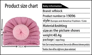 Sizing chart and dimensions for the pink knitted donut baby beanie with scale details
