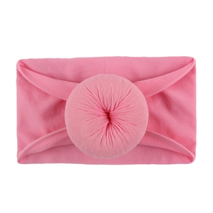 Bandeau bébé en nylon rose avec un joli nœud en forme de donut pour nourrissons