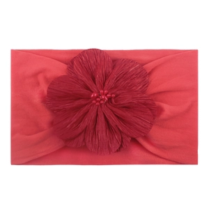 Bandeau élastique en nylon rouge pour bébé avec une grande fleur en tissu texturé