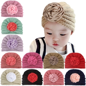 Soft warm knit baby flower turban hat with large rose decoration available in 11 colors