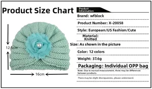 Tableau des tailles pour bonnet bébé en tricot avec fleur en mousseline et perle centrale