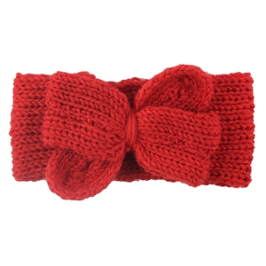 Détail d'un bandeau en maille rouge avec nœud papillon et texture en laine