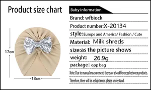 Size chart for baby turban hat with silver sequin bow, 17cm height by 18cm width