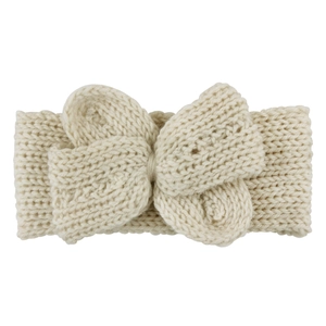 Vue détaillée d'un bandeau en maille blanc crème pour bébé avec un grand nœud texturé doux