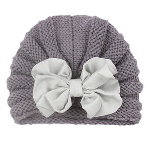 Newborn dark grey knit turban hat with a large light grey bow for autumn winter wear