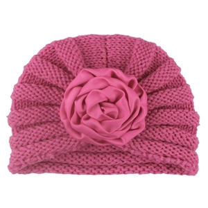 Rose pink knit baby turban hat with large decorative satin flower for autumn and winter