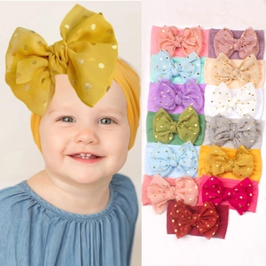 Bandeau bébé en nylon souple avec grand nœud en dentelle à pois en plusieurs couleurs