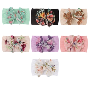 Lot de 7 bandeaux bébé en nylon souple avec grands nœuds fleuris aux tons pastels