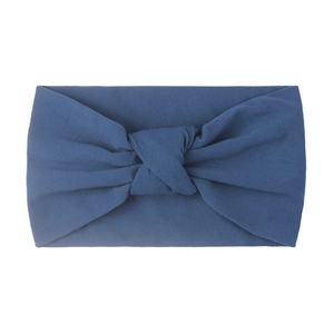 Soft navy blue nylon knotted headband for babies made of breathable high-stretch fabric