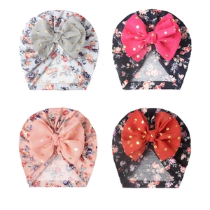 Floral baby turban hats set with large gold-dot bows in four assorted colors
