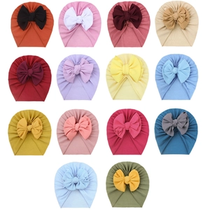 Baby bow turban hats in various colors made of soft elastic twill fabric for newborns