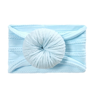 Elastic baby nylon headband featuring a soft light blue knitted donut bow decoration
