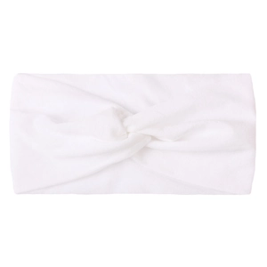 Close-up of white knotted nylon hair band showing soft fabric texture and twist detail