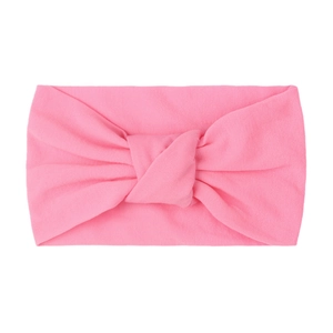Close-up of pink soft nylon wide headband featuring a double-layered knotted design