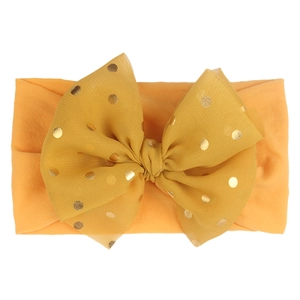 Bandeau bébé jaune gingembre avec grand nœud en dentelle à pois dorés brillants