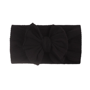 Weiches schwarzes Nylon-Jacquard-Baby-Stirnband mit einer großen elastischen Strickschleife