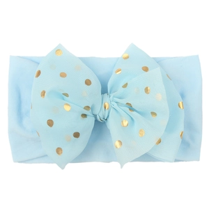 Bandeau bébé bleu clair en nylon souple avec un grand nœud en dentelle à pois dorés