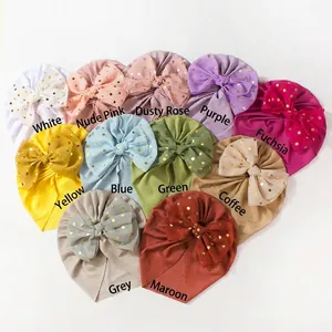 Ribbed baby turban hats with gold polka dot bows in eleven assorted vibrant colors