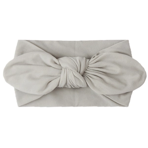 Detailed view of light gray soft nylon headband with large rabbit ear bow for babies