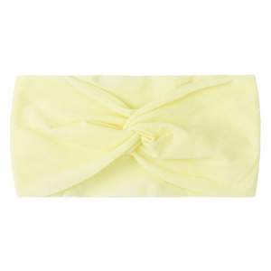 Detail of light yellow nylon knotted headband showing the soft knitted fabric texture