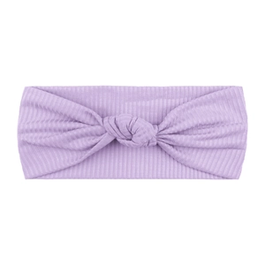 Close-up of light purple ribbed elastic baby headband featuring a soft knotted bow design