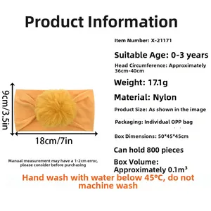 Detail showing elastic orange nylon baby headband with soft fuzzy ball and sizing chart