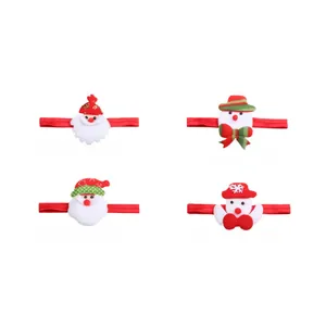 Detailansicht festlicher Weihnachts-Babystirnbänder mit Weihnachtsmann und Schneemann