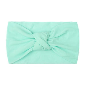 Soft mint green nylon knotted wide headband for babies with double-layered stretch fabric