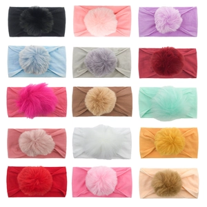 Elastic baby nylon headbands with large faux fur pompom in 15 assorted colors for infants