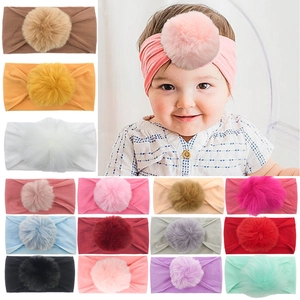 Elastic nylon baby headbands with large pom-poms in 15 assorted colors for infants