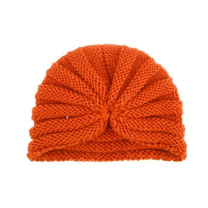 Detailed knit texture and central pleat design on an orange newborn turban beanie