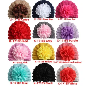 Detailed view of baby knitted flower turban hats in 12 vibrant colors for girls