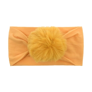 Soft elastic nylon baby headband with large ginger pom-pom for newborn girls