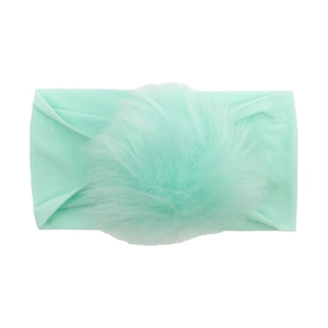 Detailed view of baby seamless headband with a large mint green soft pom-pom decoration