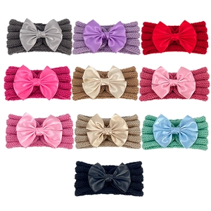 Set of 10 knitted baby headbands with large satin bows in diverse vibrant colors